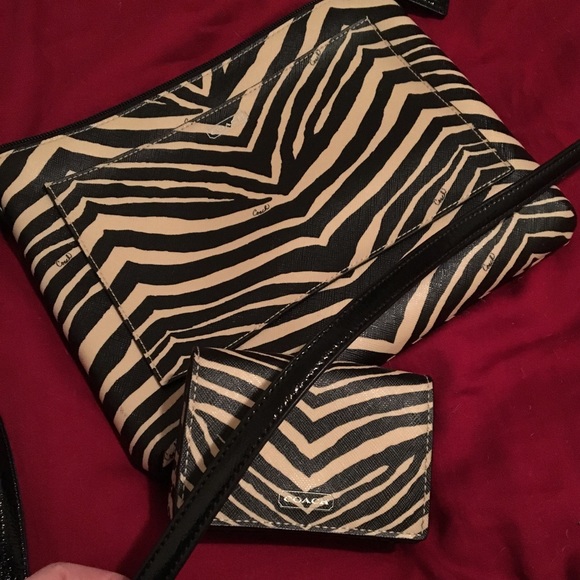 Coach Handbags - Coach set Zebra crossbody bag with matching wallet